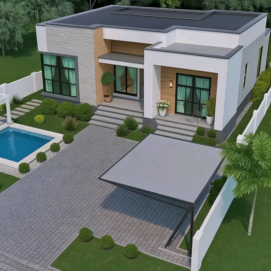 Rendered white flat-roofed house with large windows, a pool and a carport.